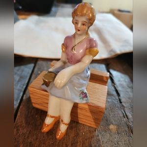 Vintage lady seated with tea cup